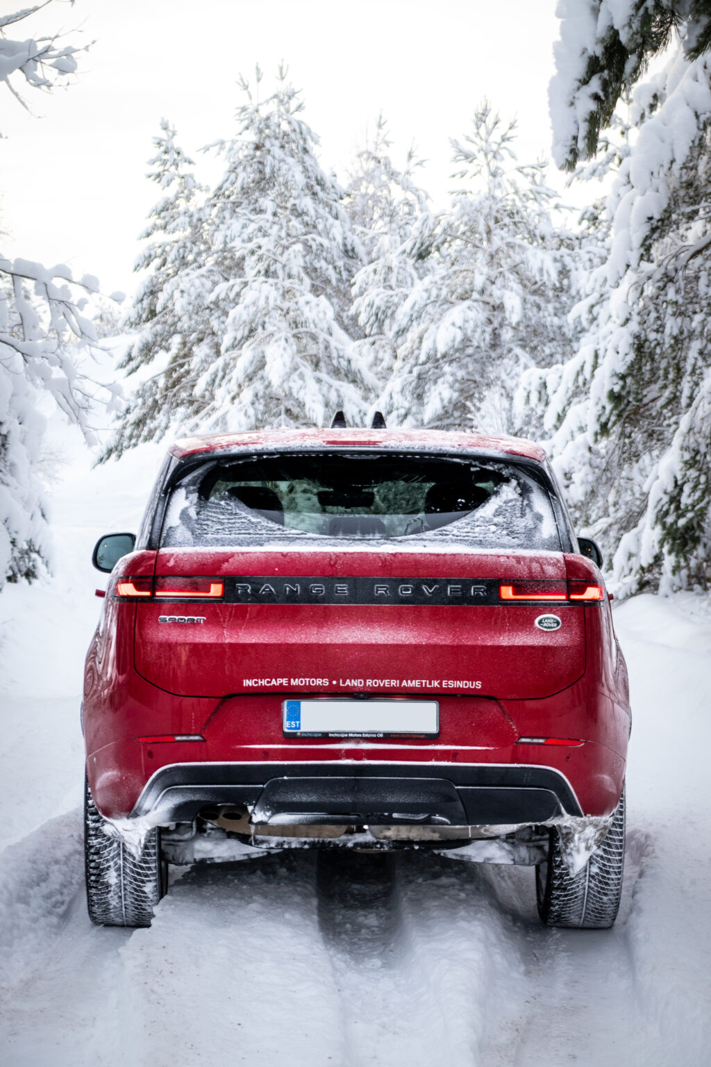 Range Rover Sport red snow